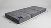 Castaway Bed 31-inch center platform mattress shown in three segmented sections with grey velvet cover and Castaway branded label, designed to fit the floor-anchored center platform when the motorized split king bed is in the open position. Measurement guide.